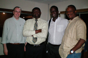 delegation at IDP camp in Liberia in 2005