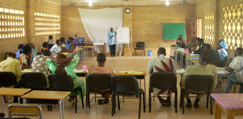 delegation at IDP camp in Liberia in 2005