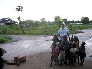 delegation at IDP camp in Liberia in 2005